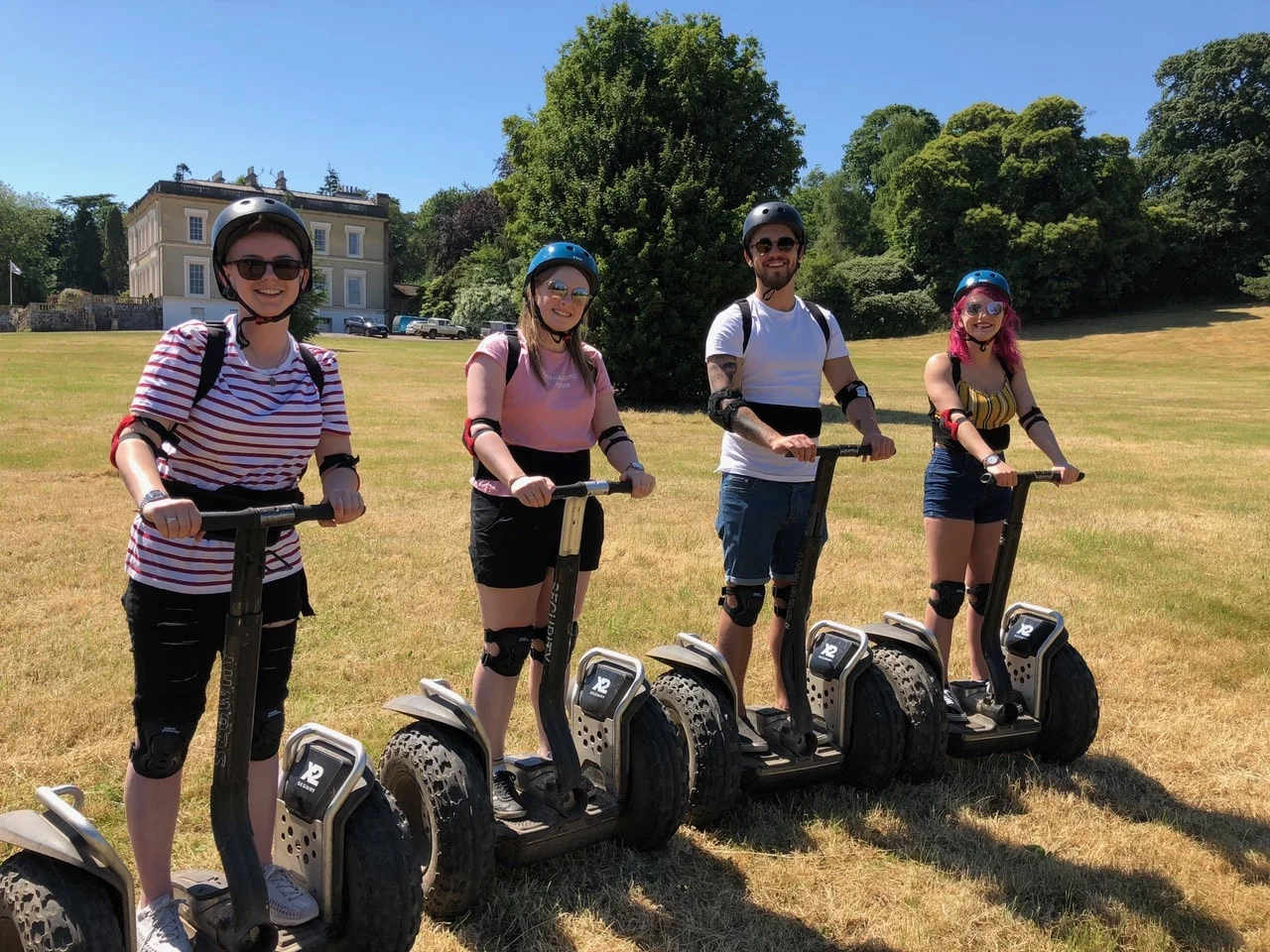 Friends on a Segway experience in the grounds of Escot Park